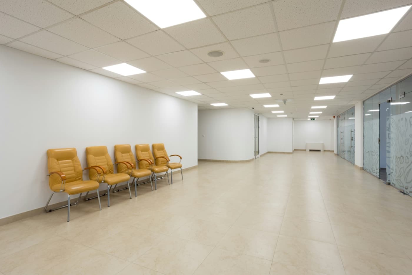 Modern high-tech security control room with multiple screens