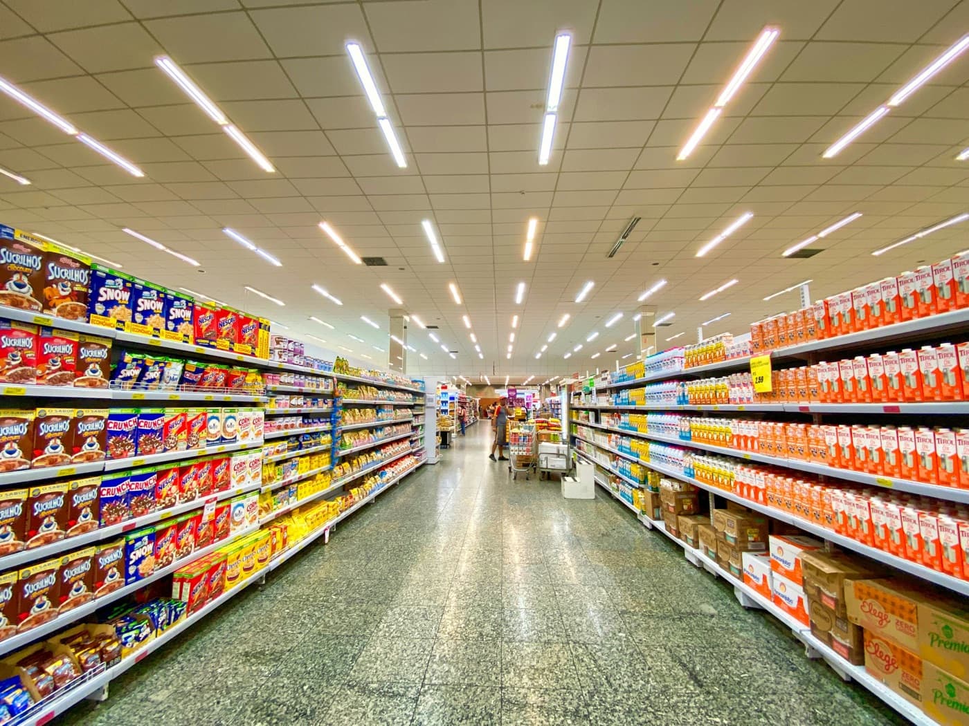 Supermarket aisle with shelves of products